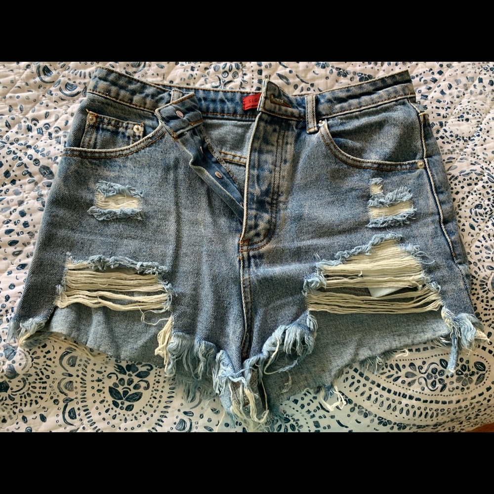 Light wash distressed jean shorts